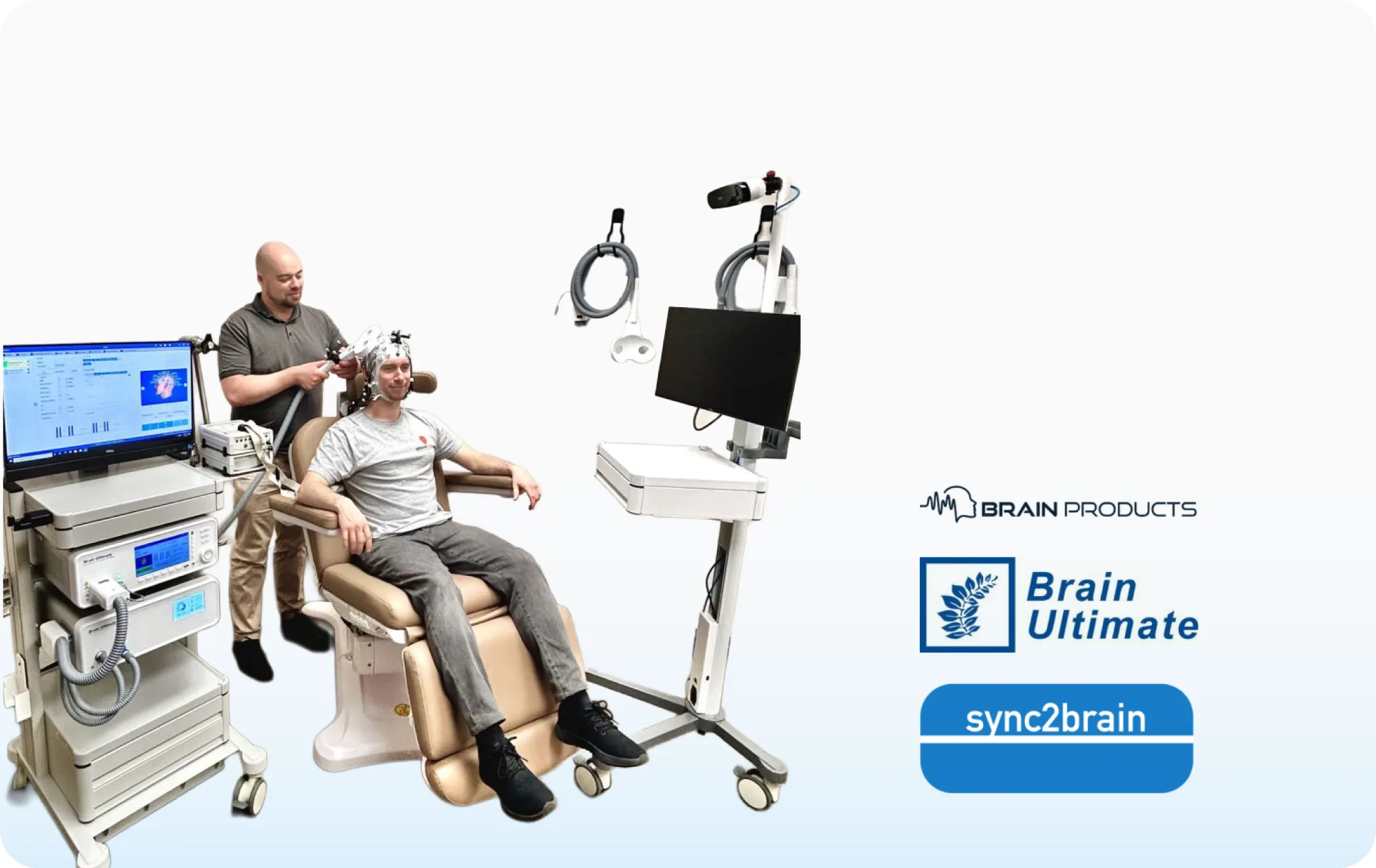 Researcher running a TMS-EEG session with neuronavigation equipment